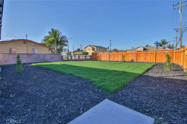 a front view of house with a yard and garage