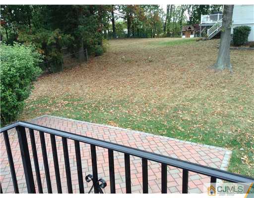 46 Harmon Road Edison, NJ 08837 - Photo 16 of 17 a big yard with lots of green space