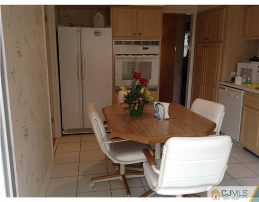 46 Harmon Road Edison, NJ 08837 - Photo 9 of 17 a view of a dining room with furniture