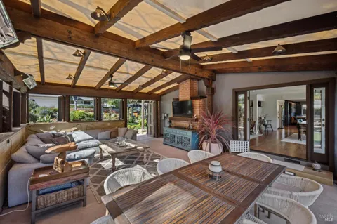 a view of a livingroom with furniture