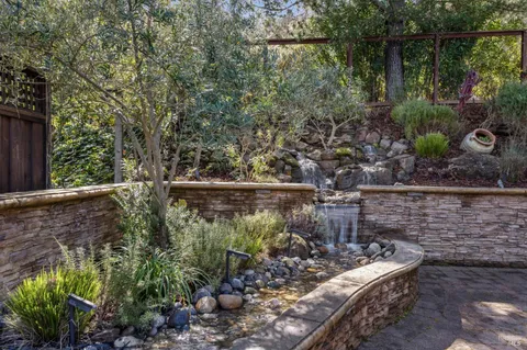 a bathroom with a shower and toilet