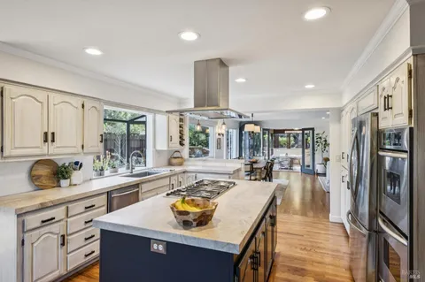 a view of a two chairs in the patio