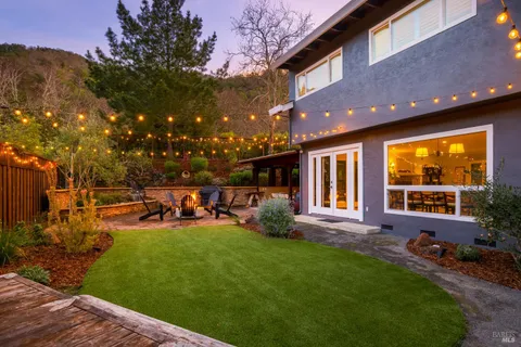 an aerial view of residential house with outdoor space