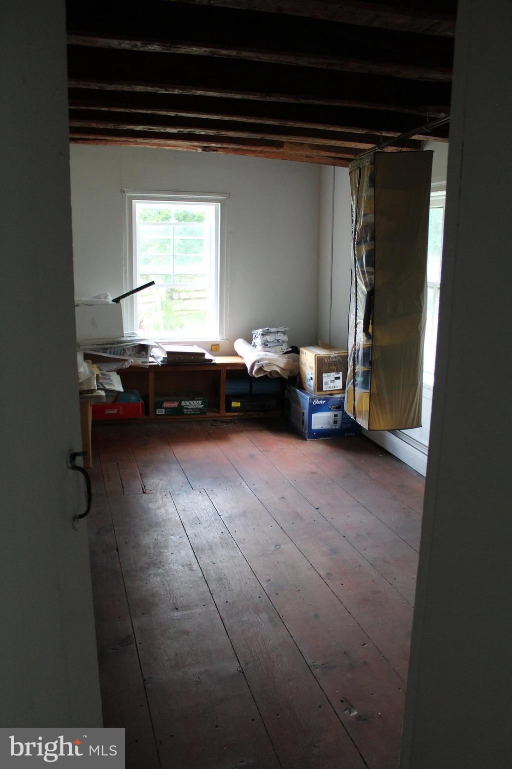 3359 Poplar Run Road Manchester, MD 21102 - Photo 17 of 30 a living room with furniture and a window