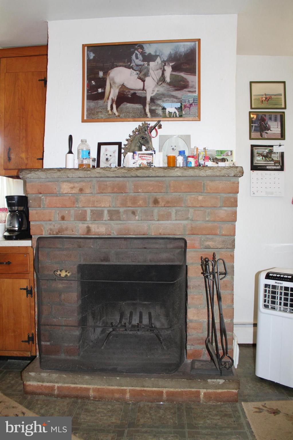 3359 Poplar Run Road Manchester, MD 21102 - Photo 8 of 30 a living room with granite countertop furniture and a fireplace