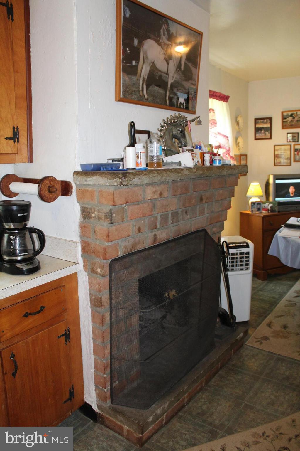 3359 Poplar Run Road Manchester, MD 21102 - Photo 9 of 30 a stove top oven sitting inside of a kitchen