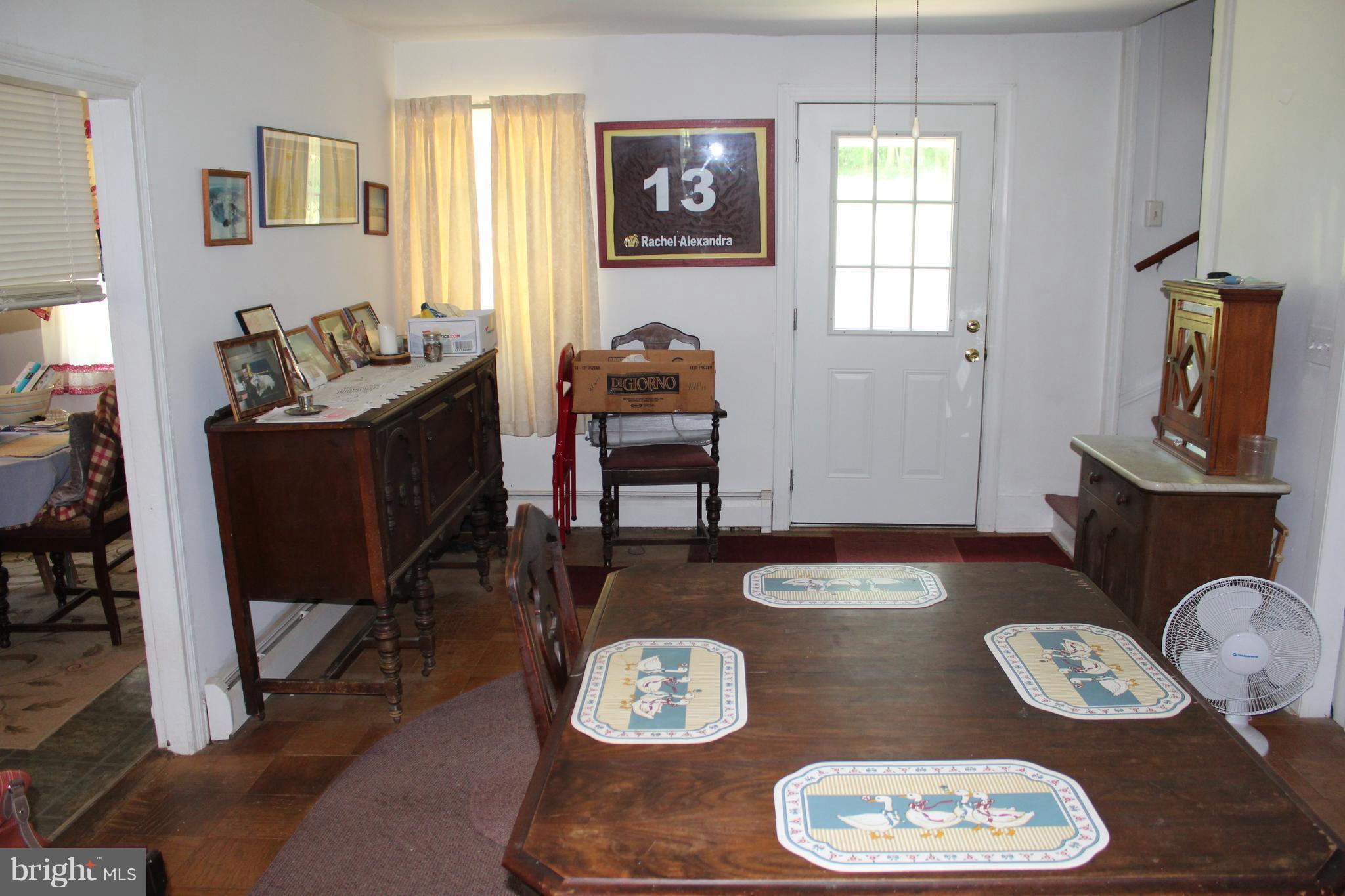 3359 Poplar Run Road Manchester, MD 21102 - Photo 10 of 30 a living room with furniture and a table