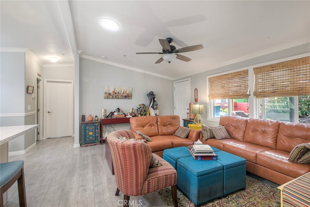 3909 Reche Road, Unit 125 Fallbrook, CA 92028 - Photo 6 of 58 a living room with furniture and a large window