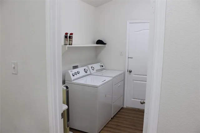 a utility room with dryer and washer