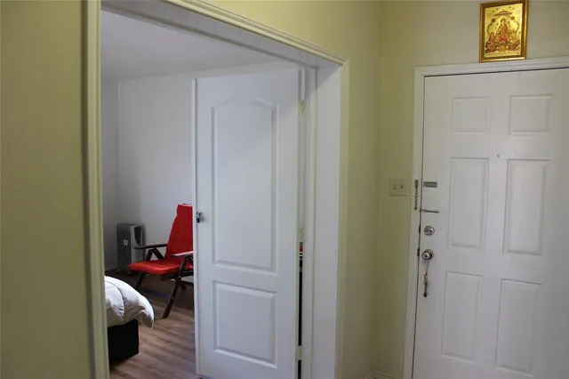 a room that has a bed and a closet with storage
