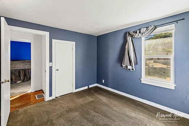 a view of livingroom with hardwood floor and a ceiling fan