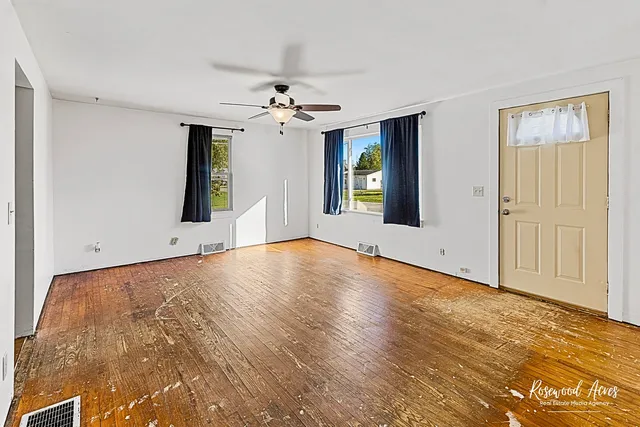 a view of an empty room with window