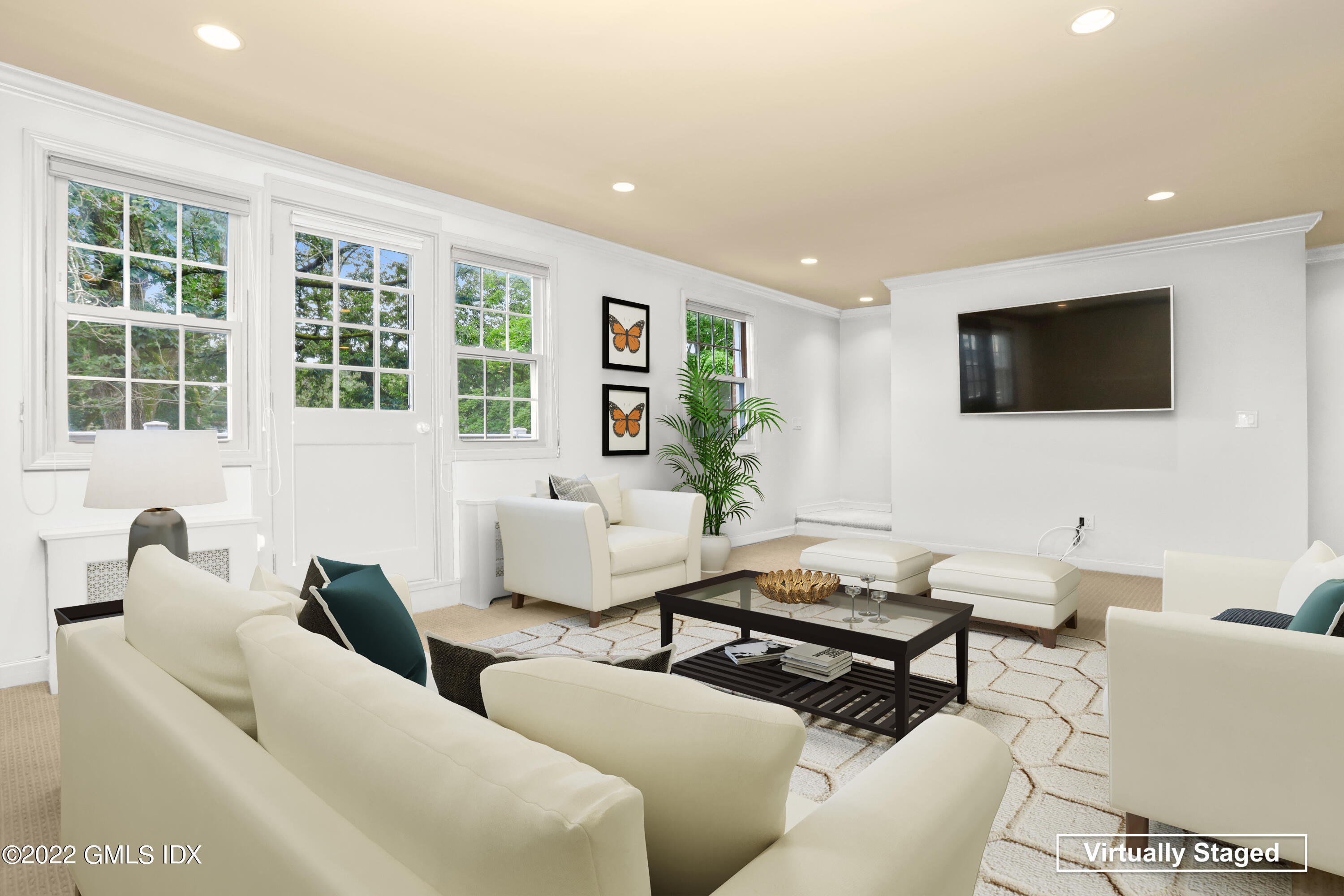 80 Putnam Park Greenwich, CT 06830 - Photo 4 of 20 a living room with furniture and a flat screen tv