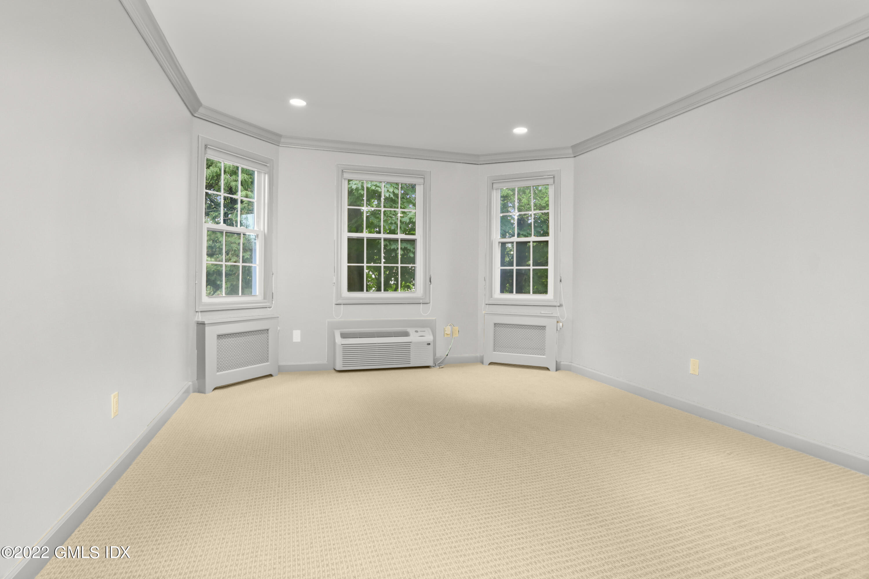 80 Putnam Park Greenwich, CT 06830 - Photo 8 of 20 an empty room with a window