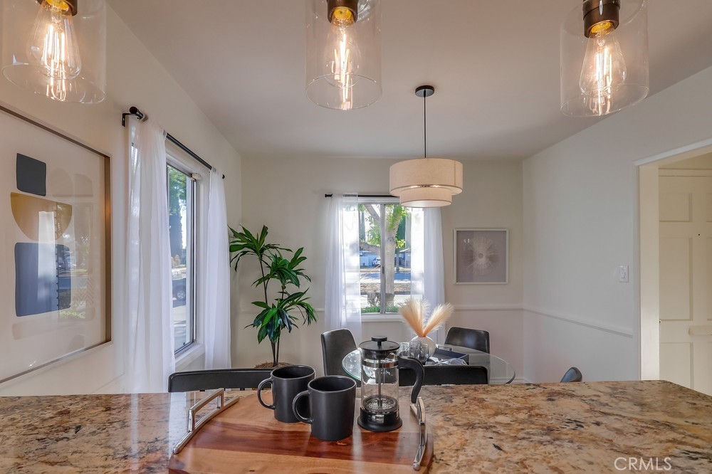 3562 North Studebaker Road Long Beach, CA 90808 - Photo 14 of 39 a living room with furniture chandelier and a window