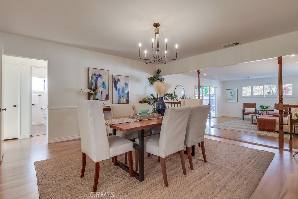 3562 North Studebaker Road Long Beach, CA 90808 - Photo 15 of 39 a view of a dining room with furniture and wooden floor