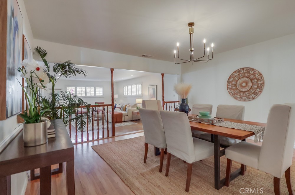 3562 North Studebaker Road Long Beach, CA 90808 - Photo 17 of 39 a view of a dining room with furniture window and wooden floor