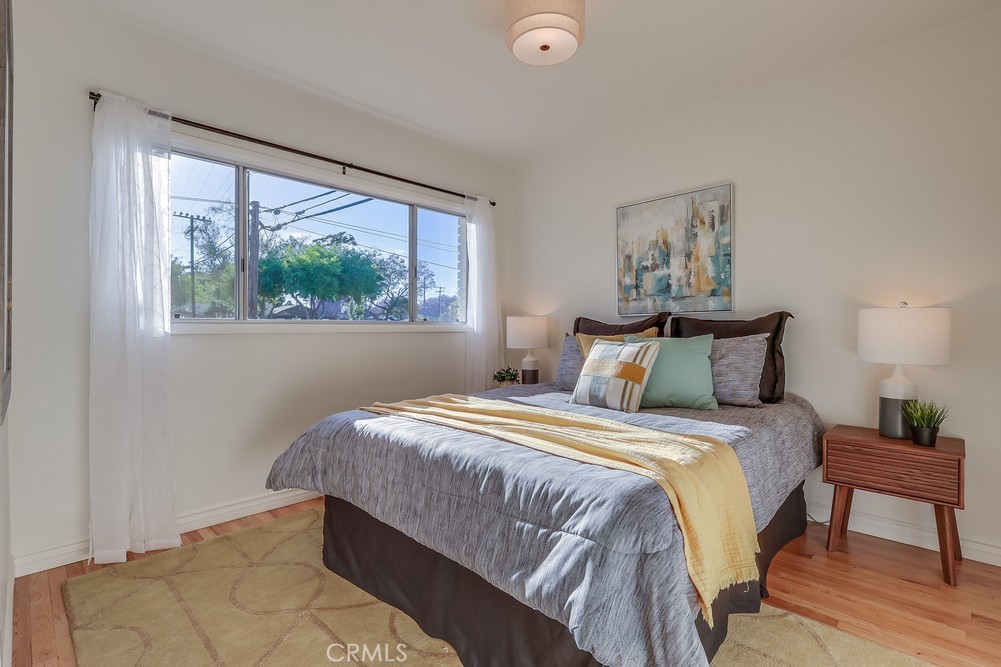 3562 North Studebaker Road Long Beach, CA 90808 - Photo 28 of 39 a bedroom with a bed and a painting on the wall