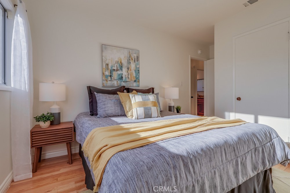 3562 North Studebaker Road Long Beach, CA 90808 - Photo 29 of 39 a bedroom with a bed and a painting on the wall