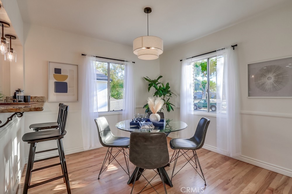 3562 North Studebaker Road Long Beach, CA 90808 - Photo 3 of 39 a dining room with furniture window and wooden floor