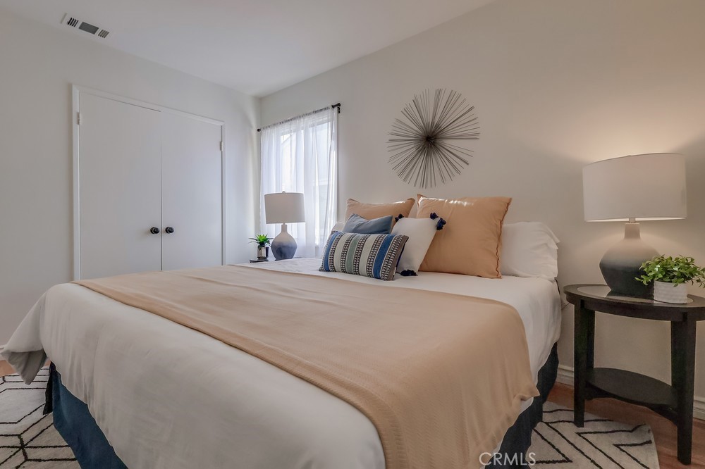 3562 North Studebaker Road Long Beach, CA 90808 - Photo 31 of 39 a bedroom with a bed and window