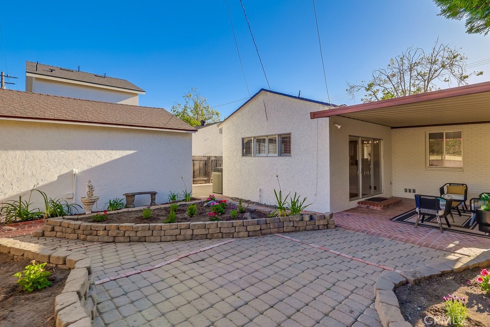 3562 North Studebaker Road Long Beach, CA 90808 - Photo 35 of 39 a front view of a house with garden