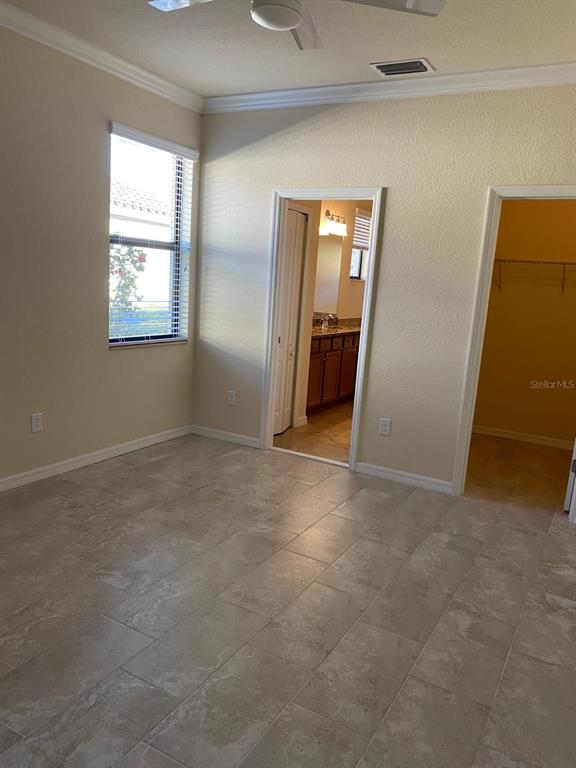12792 Richezza Drive Venice, FL 34293 - Photo 11 of 24 an empty room with windows and closet