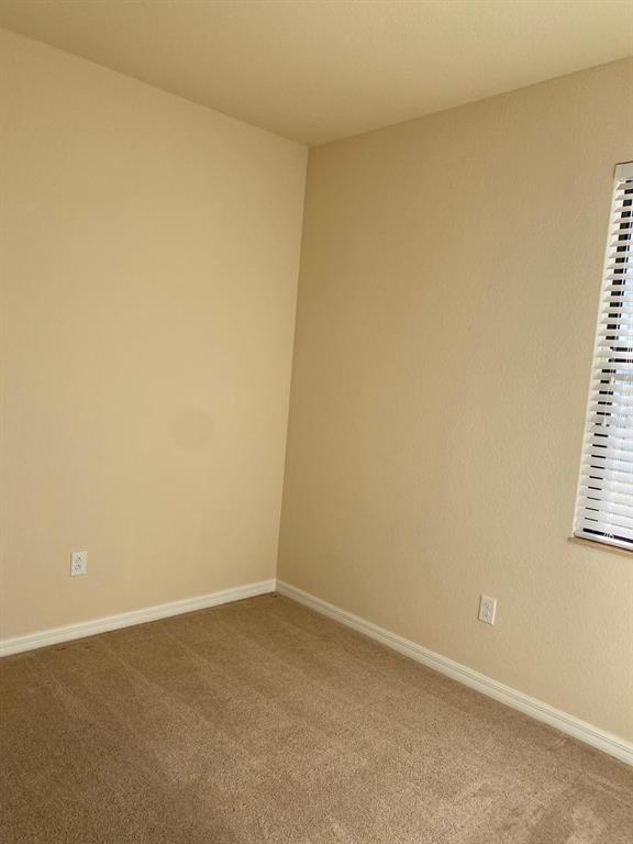 12792 Richezza Drive Venice, FL 34293 - Photo 17 of 24 an empty room with windows