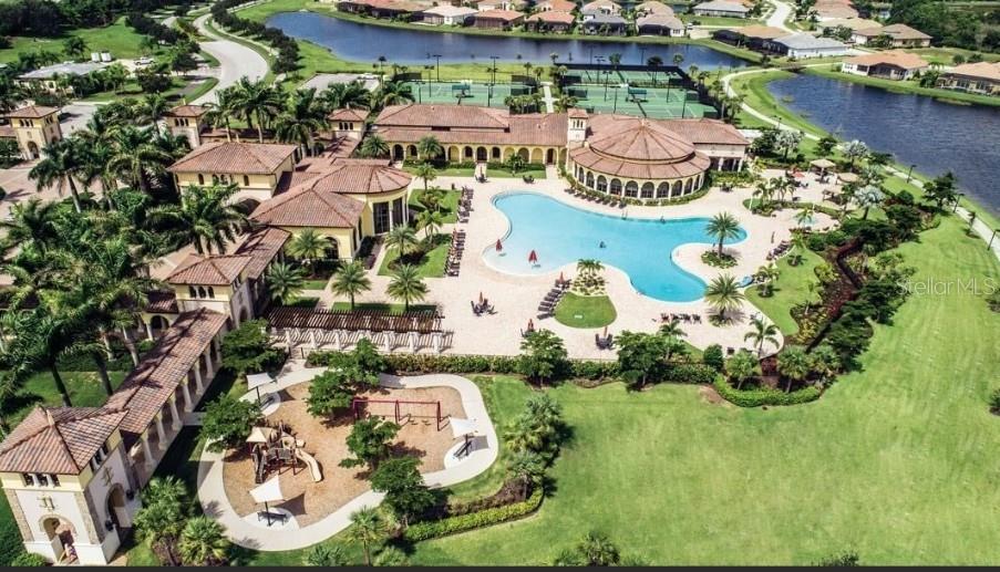 12792 Richezza Drive Venice, FL 34293 - Photo 20 of 24 an aerial view of residential houses with outdoor space and swimming pool