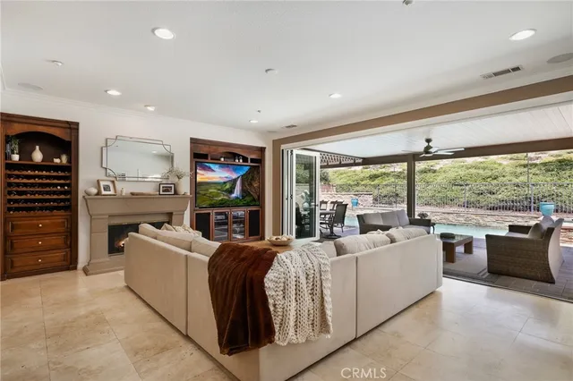 a kitchen with stainless steel appliances granite countertop a refrigerator and a stove