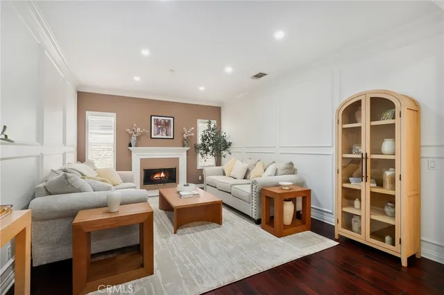 a kitchen with stainless steel appliances a refrigerator sink and stove