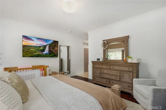 a view of a patio with table and chairs with wooden floor and fence