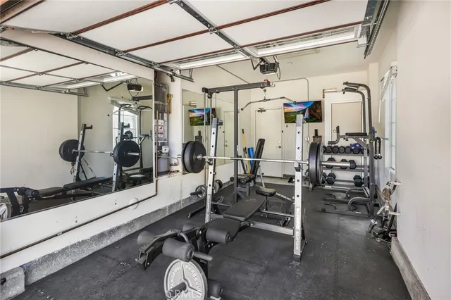 an aerial view of residential house and green space
