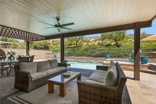 a front view of a house with garden and parking