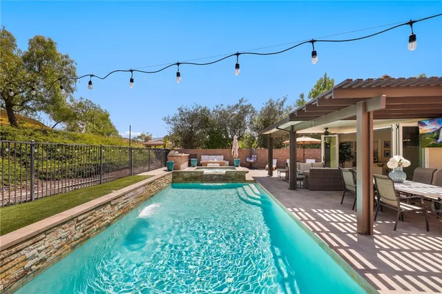 a view of a park with swings and slides