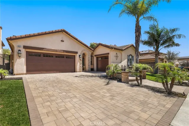 an aerial view of residential house and green space