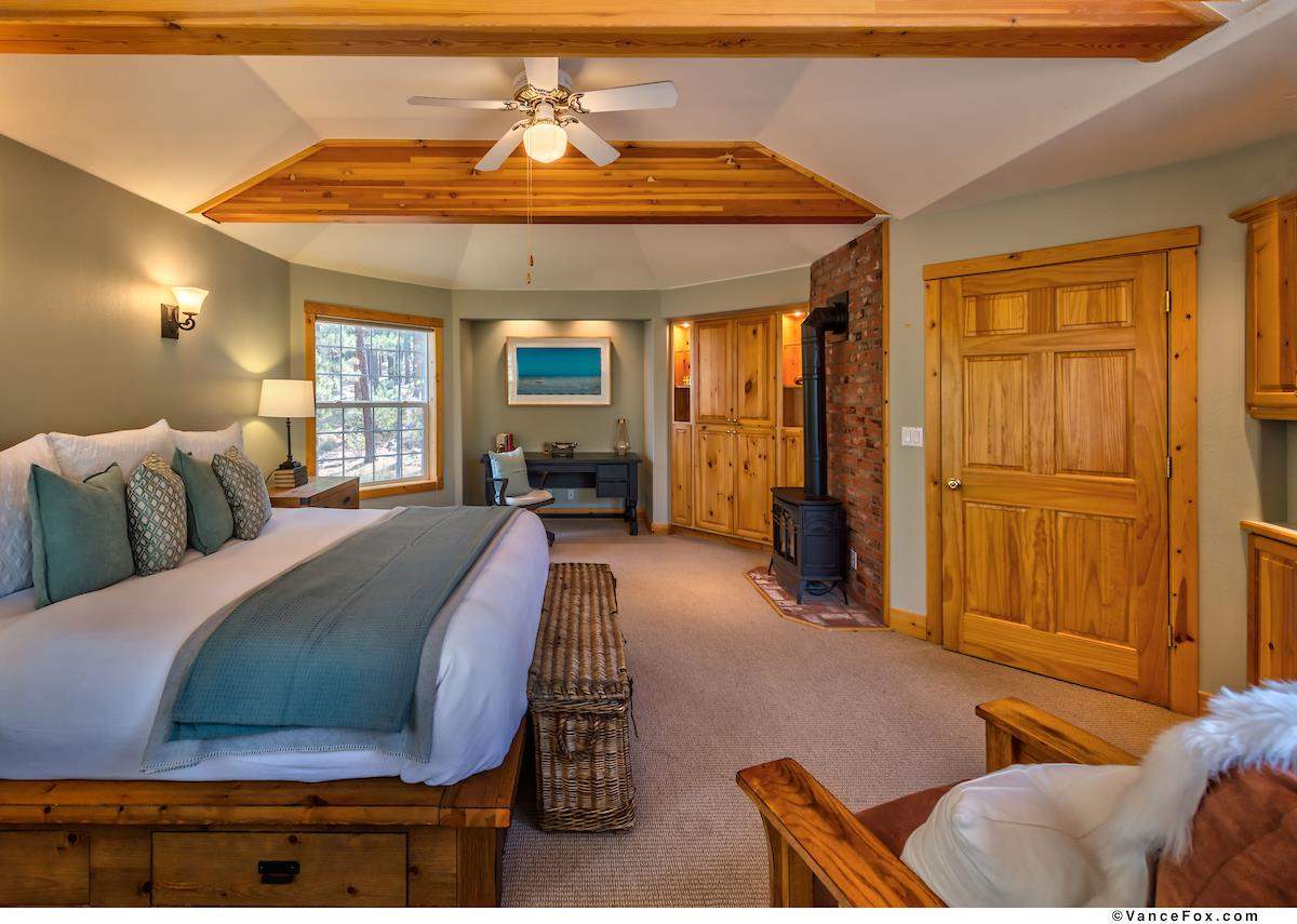 378 Skidder Trail Truckee, CA 96161 - Photo 12 of 21 a spacious bedroom with a bed and window