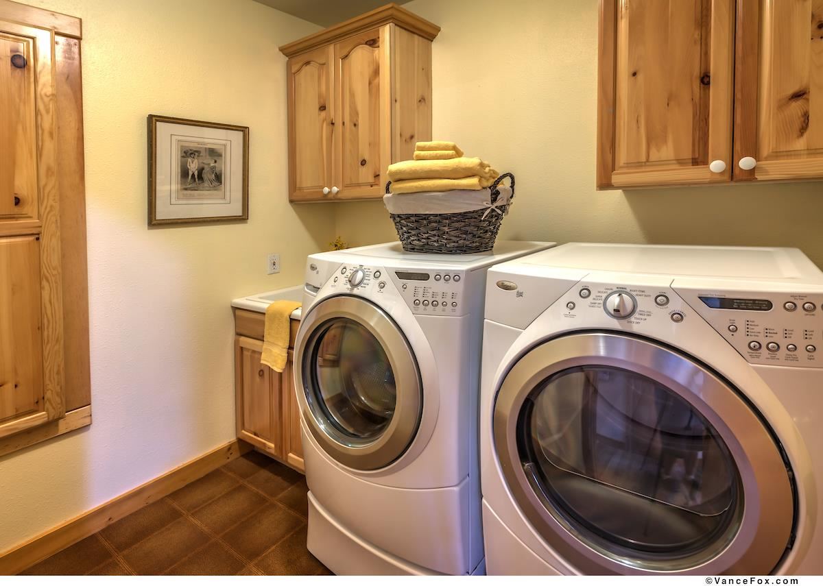 378 Skidder Trail Truckee, CA 96161 - Photo 21 of 21 a utility room with dryer and washer