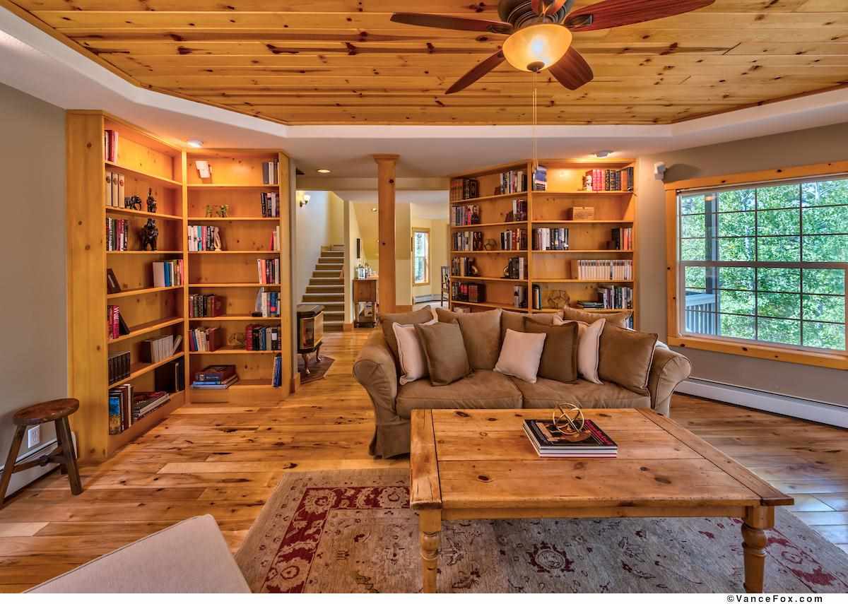 378 Skidder Trail Truckee, CA 96161 - Photo 7 of 21 a living room with furniture a rug and a chandelier