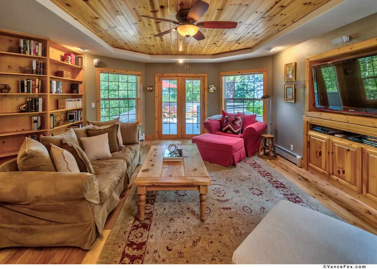 378 Skidder Trail Truckee, CA 96161 - Photo 8 of 21 a bedroom with furniture window and flat screen tv