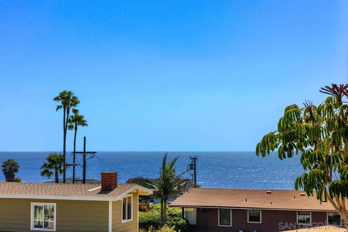 172 Avocado Street Encinitas, CA 92024 - Photo 12 of 19 a front view of a house with a garden
