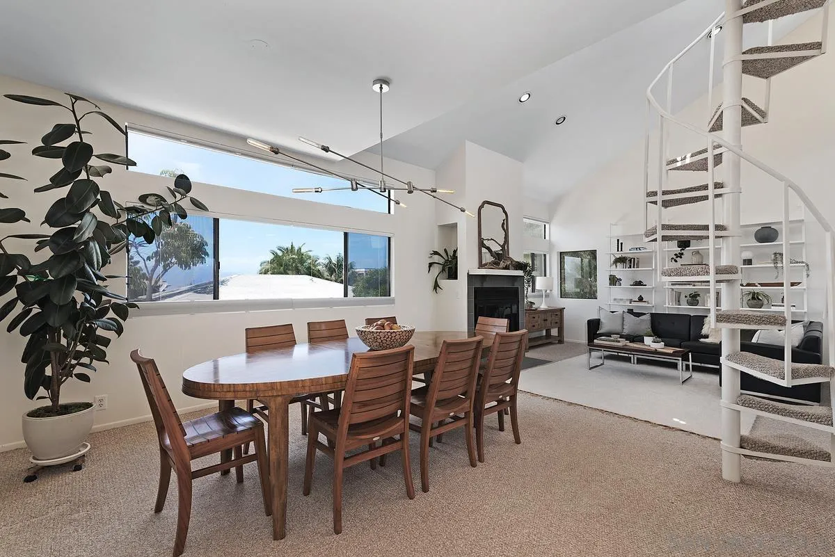 172 Avocado Street Encinitas, CA 92024 - Photo 5 of 19 a view of a dining room with furniture and chandelier