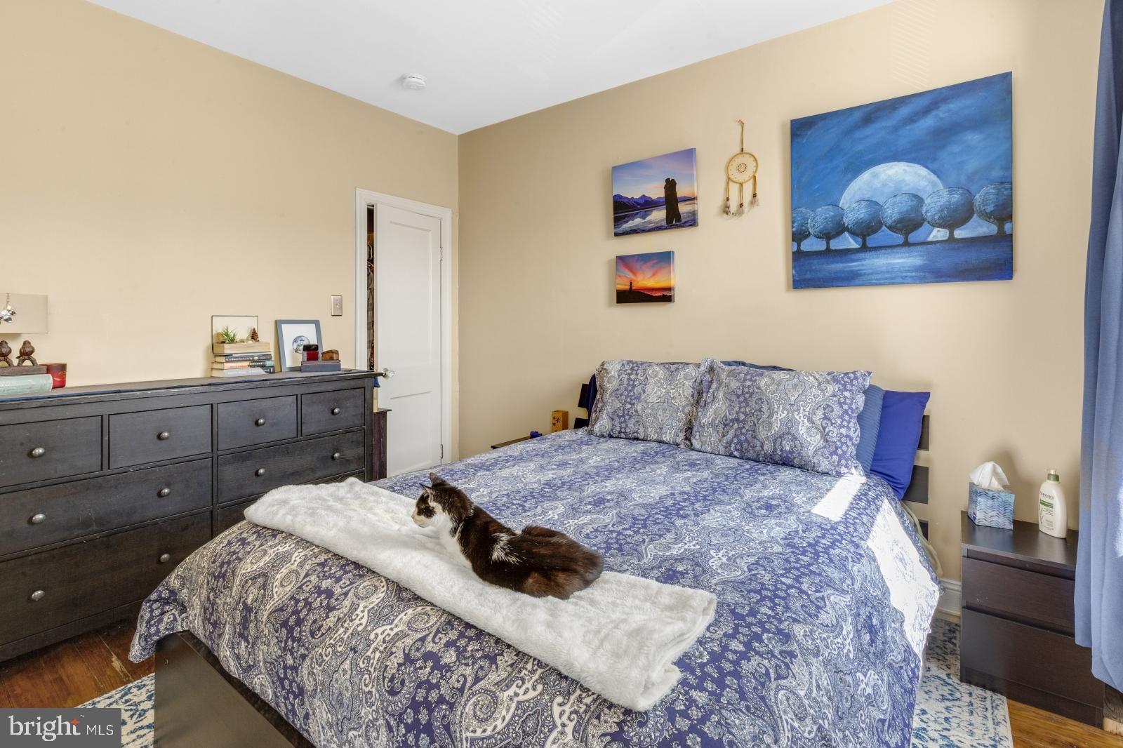 2228 Taggert Street Philadelphia, PA 19125 - Photo 12 of 23 a spacious bedroom with a bed and a desk