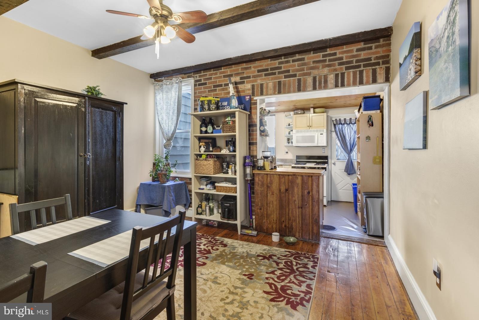 2228 Taggert Street Philadelphia, PA 19125 - Photo 5 of 23 a view of a dining room with furniture window and wooden floor