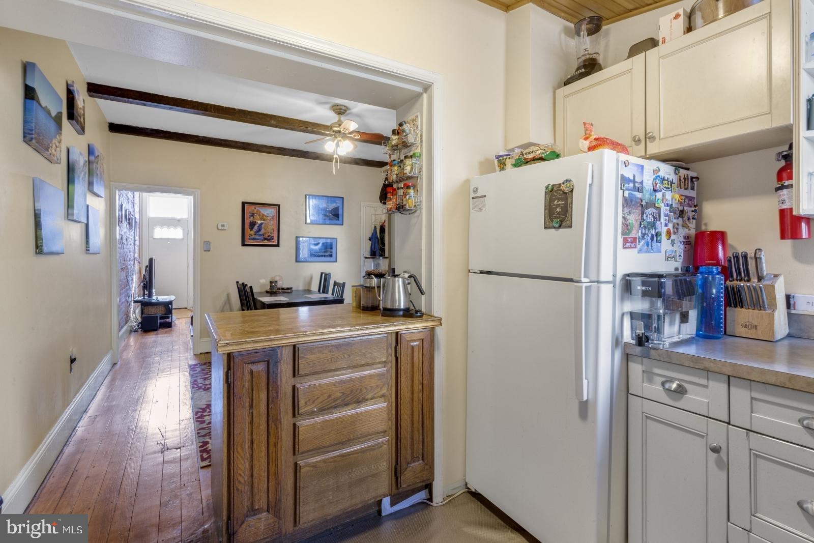 2228 Taggert Street Philadelphia, PA 19125 - Photo 8 of 23 a kitchen with refrigerator and cabinets