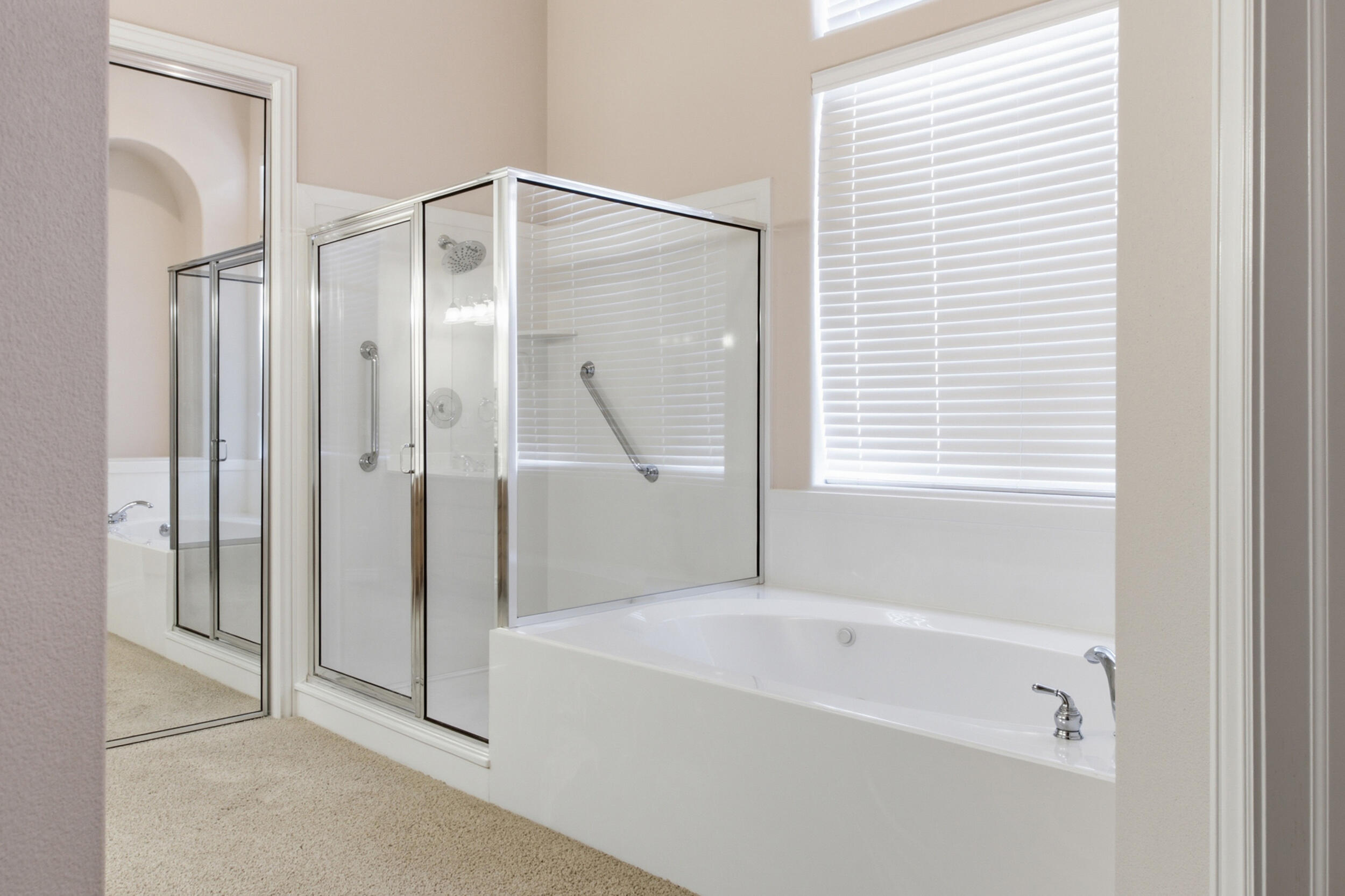 1073 Shadow Ridge Court, Unit 1073 Washington, UT 84780 - Photo 11 of 24 Primary bathroom with separate shower and tub