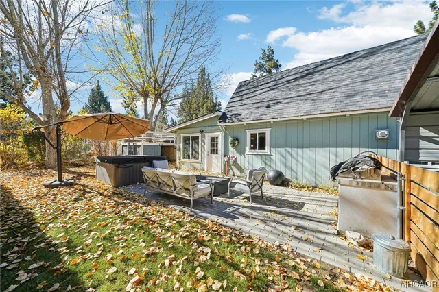 a front view of a house with a patio