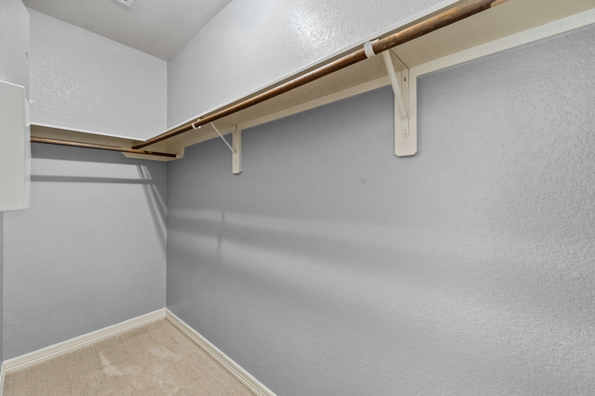 1405 Big Hill Road Winnie, TX 77665 - Photo 36 of 43 a view of a room with racks on the wall
