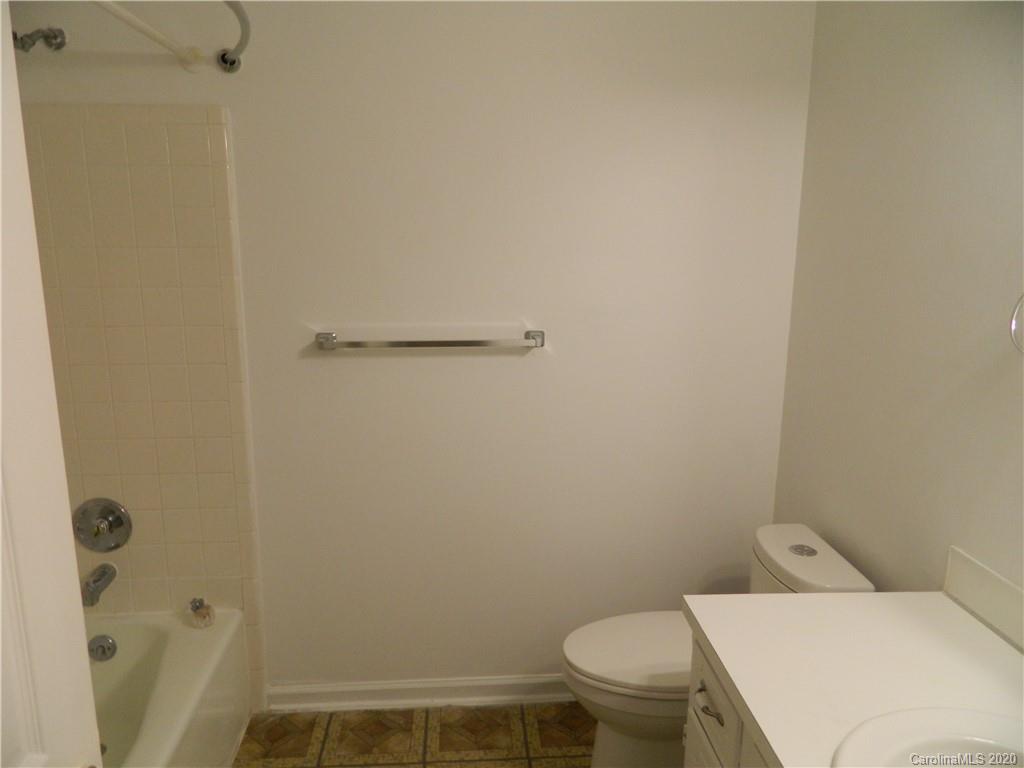 5718 Trotters Ridge Road Charlotte, NC 28227 - Photo 12 of 18 a white toilet sitting next to a shower
