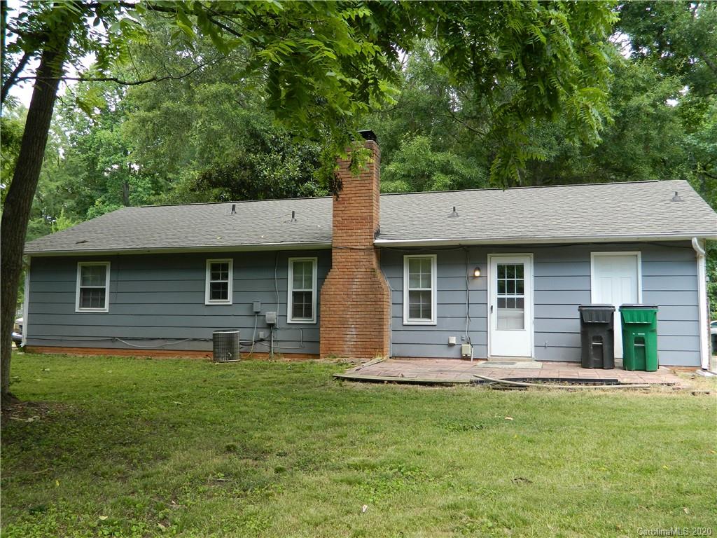 5718 Trotters Ridge Road Charlotte, NC 28227 - Photo 18 of 18 a front view of a house with a yard